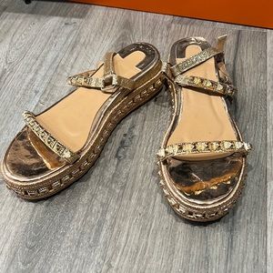 Gold and red sandals